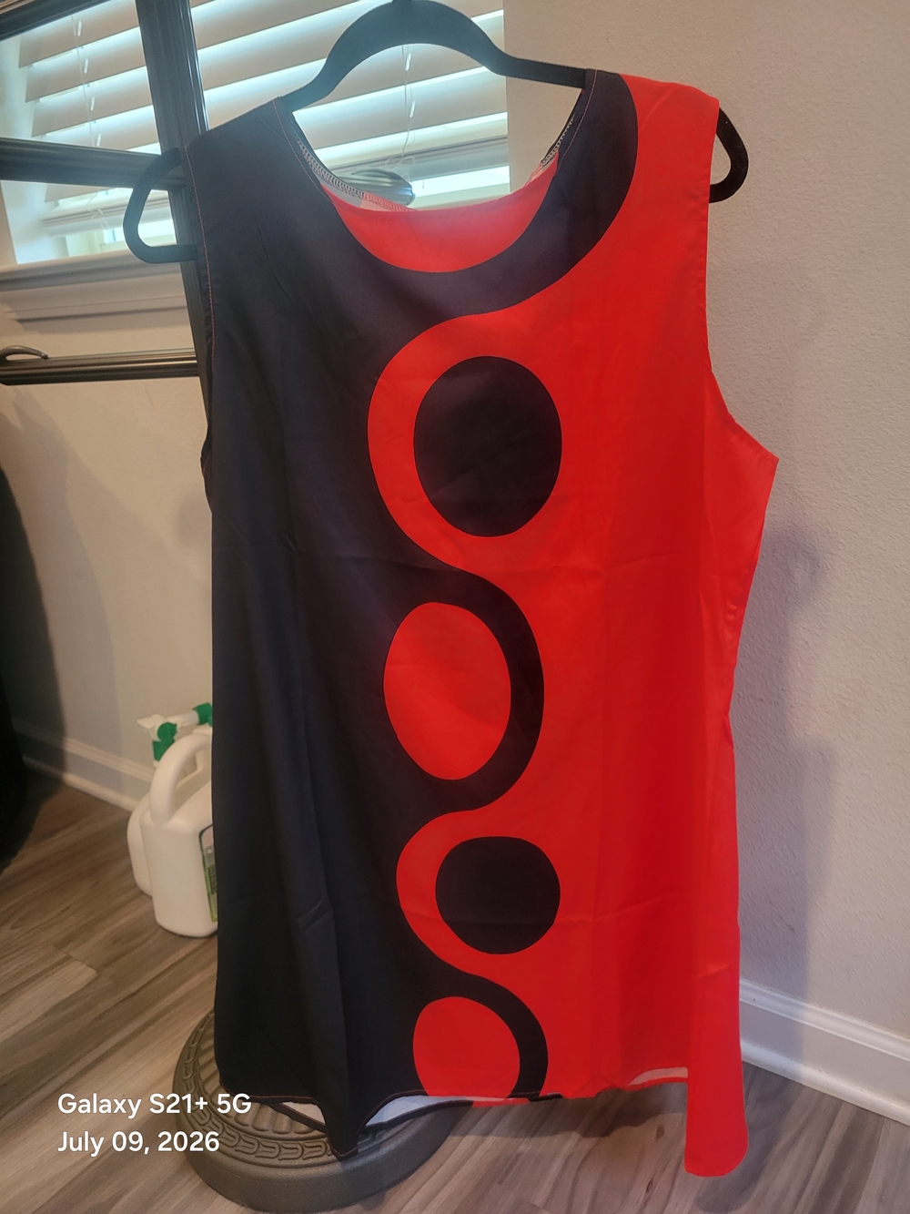 Sleeveless Red and Black Shift Dress with Graphic Circles